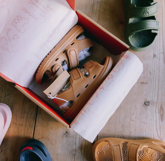 New tan Wonderskips toddler sandals in original packaging, ready for shipping as high-quality kids' summer footwear.